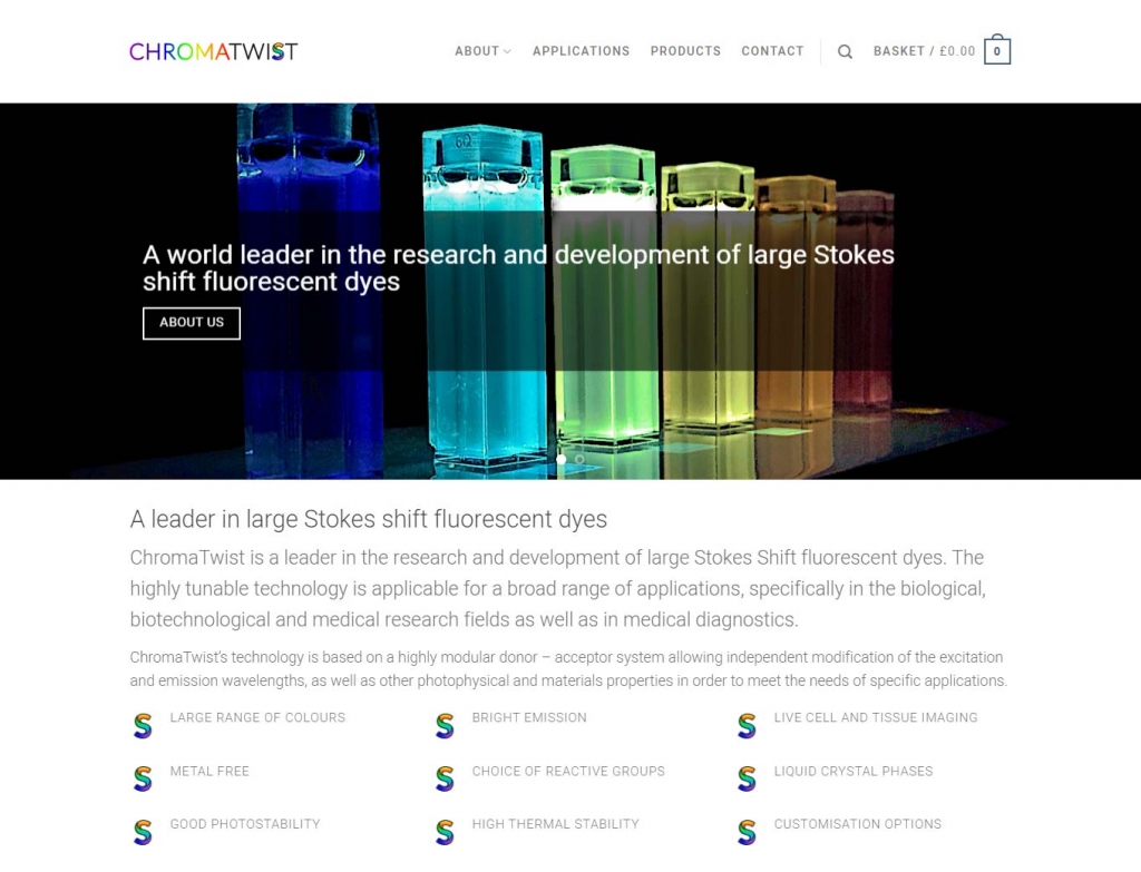 Colourful glass bottles lit up on the ChromaTwist WooCommerce web design